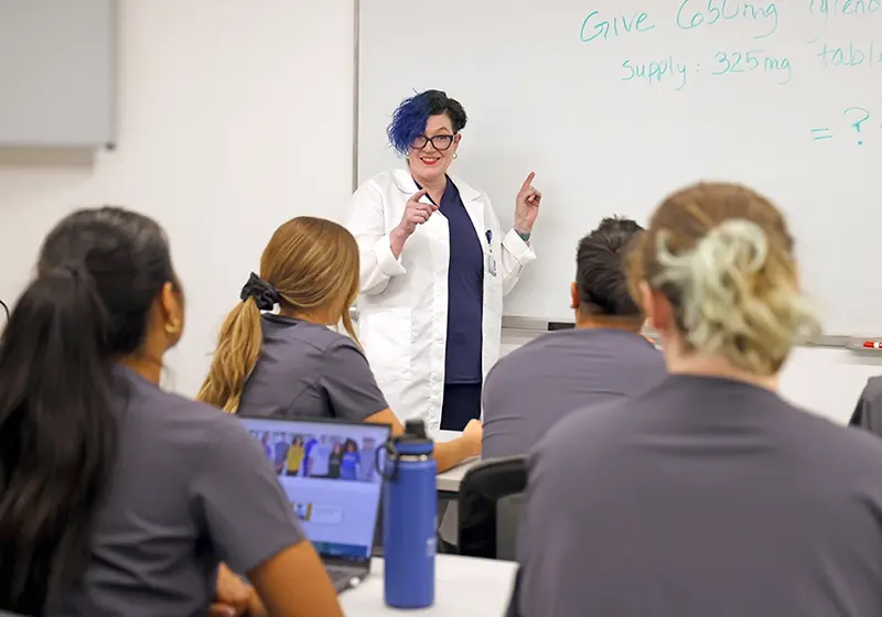 Erica Martinez, Westcliff University College of Nursing, teaching students in classroom