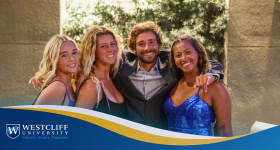 Westcliff University student-athletes and coaches celebrating at the Blue & Gold Gala awards night at Tustin Ranch Golf Course